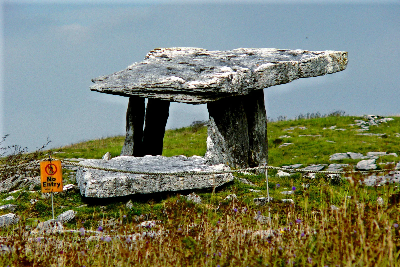 Poulnabrone dolmen in the limestone landscape of the Burren