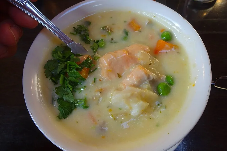Seafood chowder with pieces of fish, an illustration of Irish coastal cooking.